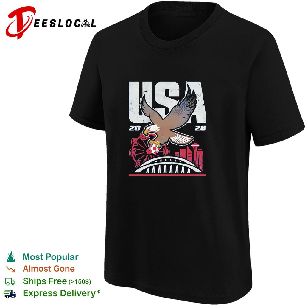 Bald eagle gripping soccer ball USA 2026 Seattle World Cup skyline shirt